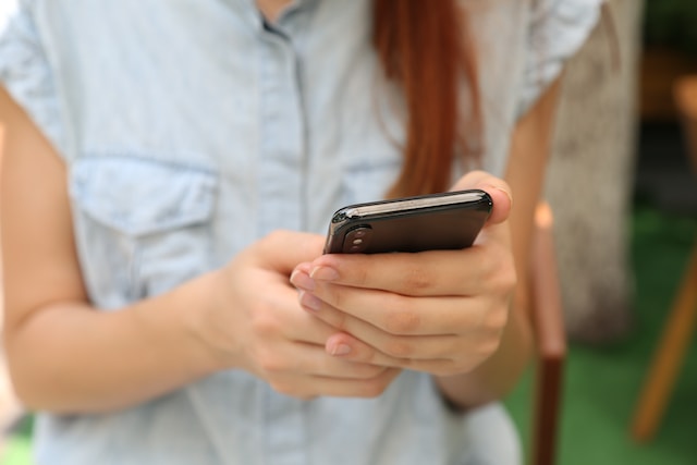 Person Holding a Smartphone